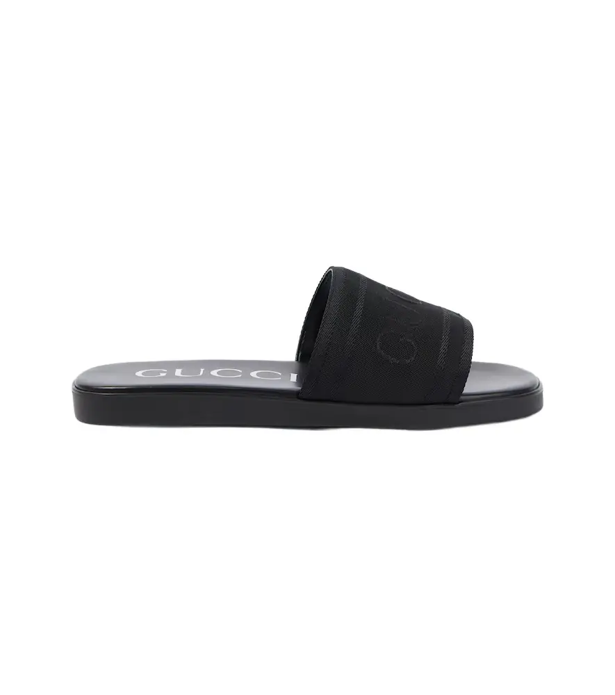 Gucci Logo canvas and leather slides